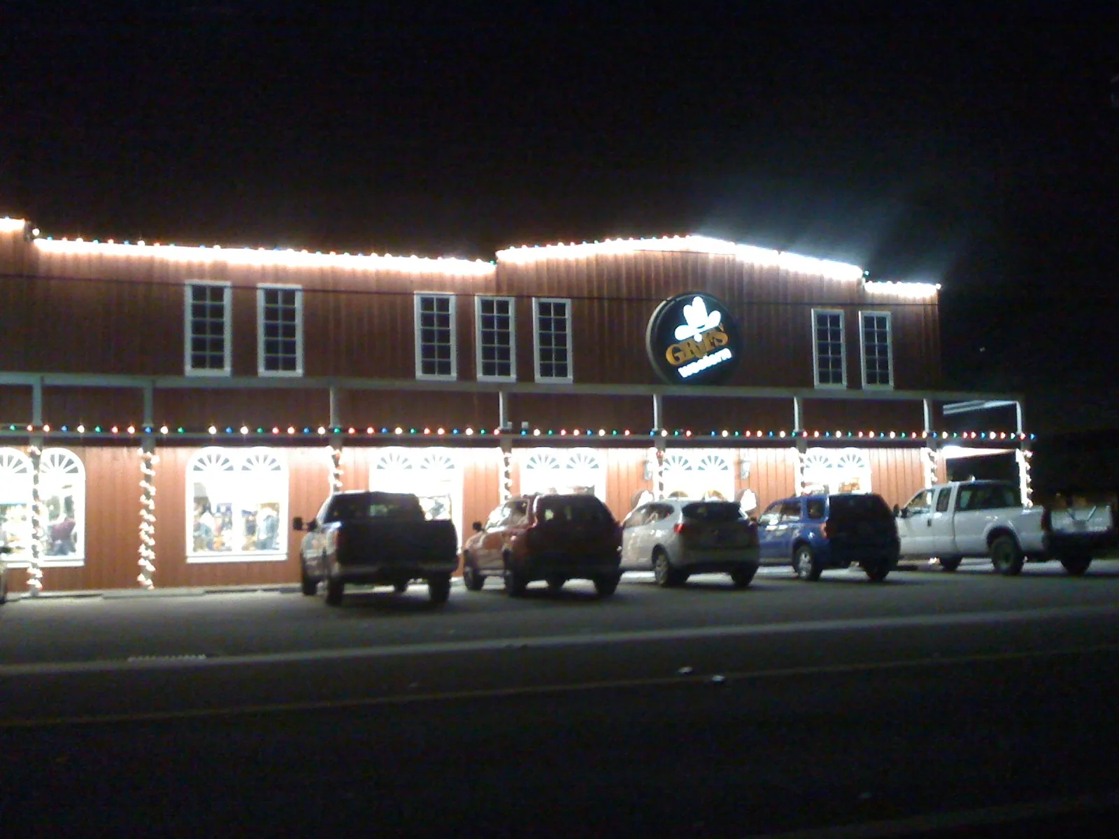 A Western-style store in Davie lit up at night.